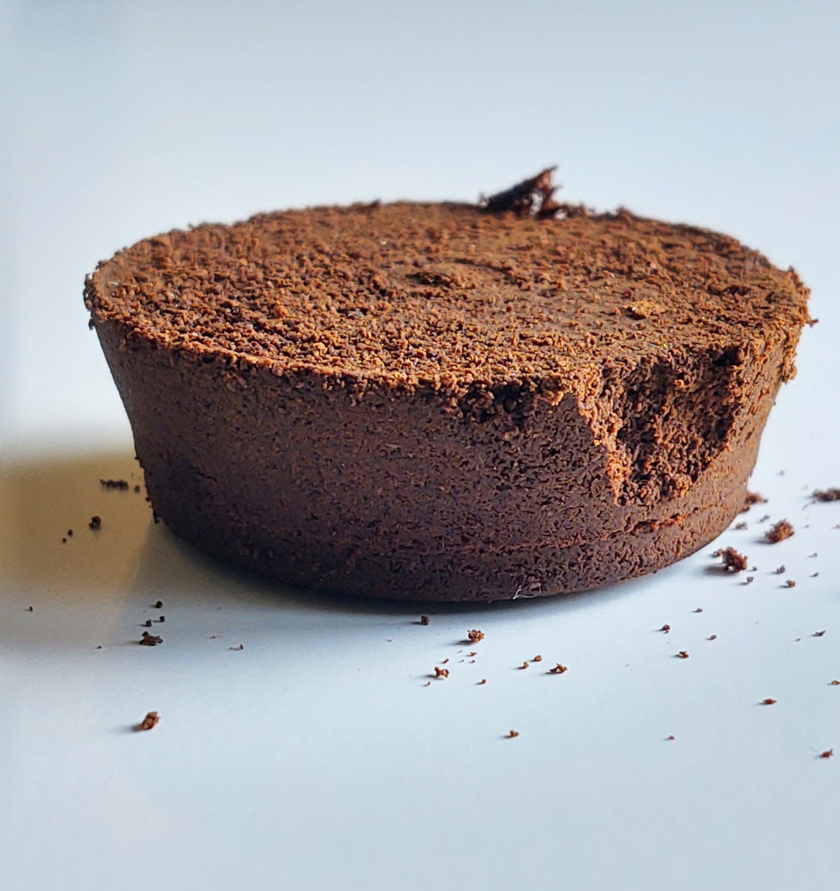 Close up of an espresso coffee puck