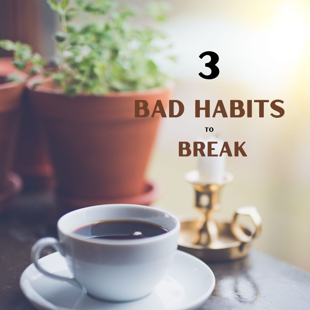 cup and saucer of coffee with plant and candle in the background.  Text that reads 3 bad habits to break
