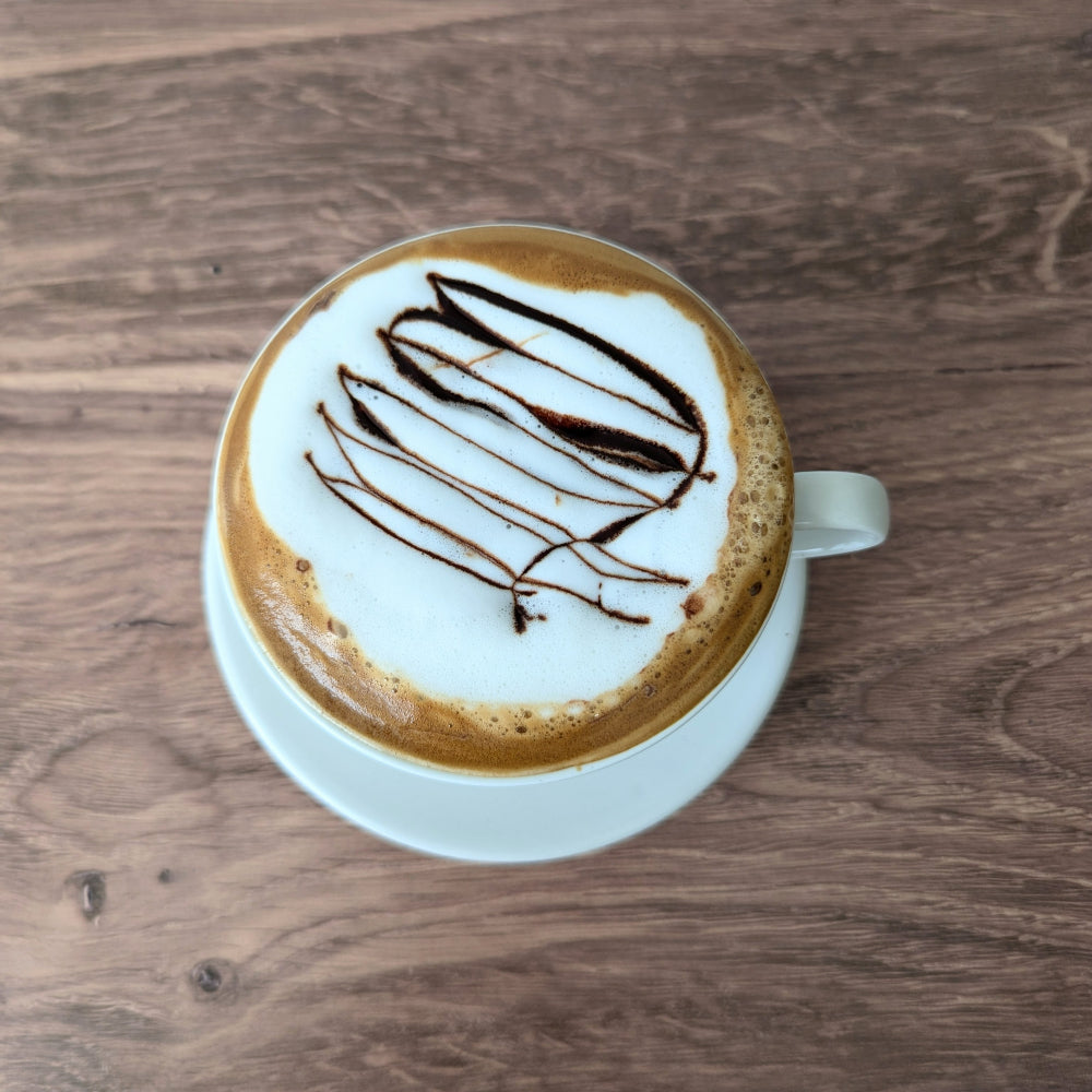 Cafe mocha with a chocolate drizzle