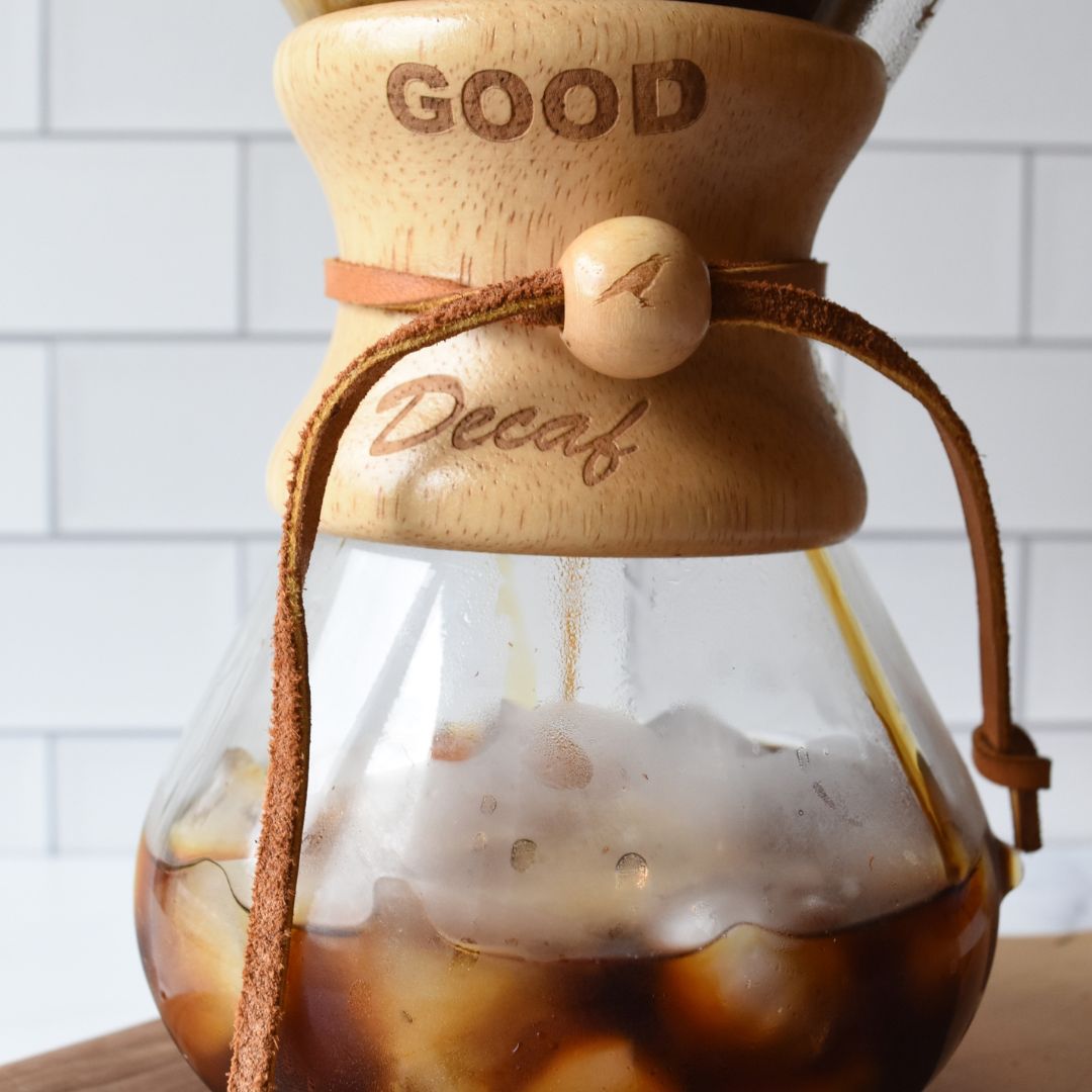Ice and coffee in a glass Chemex brewer
