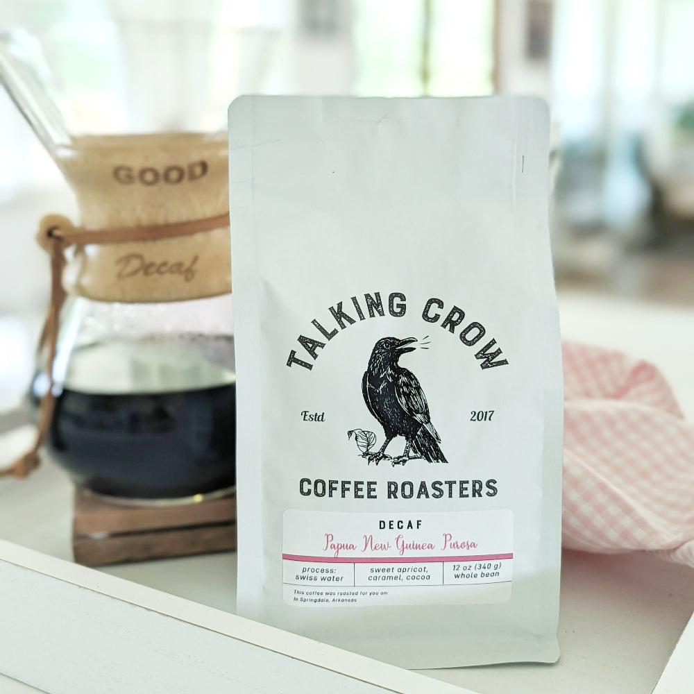 12 oz bag of Talking Crow Coffee Roasters Organic Single Origin Decaf Papua New Guinea Purosa Whole Bean Coffee