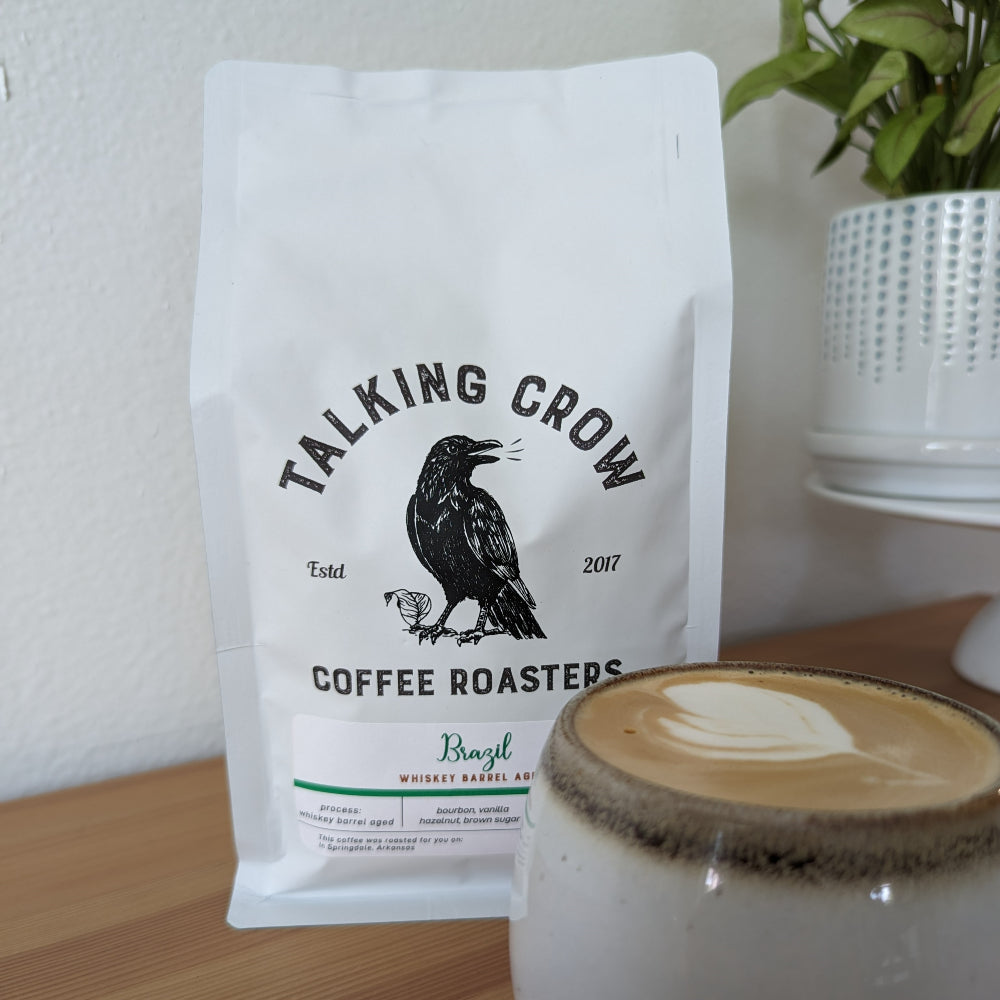 12 oz bag of Talking Crow Coffee Roasters Regular Whiskey Barrel Aged Brazil whole bean coffee